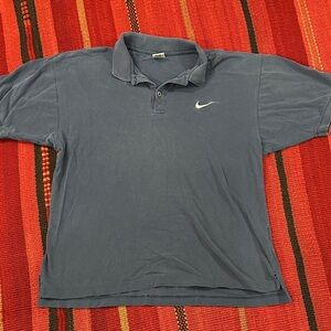 Vintage Nike Men's Navy Polo with White Swoosh
